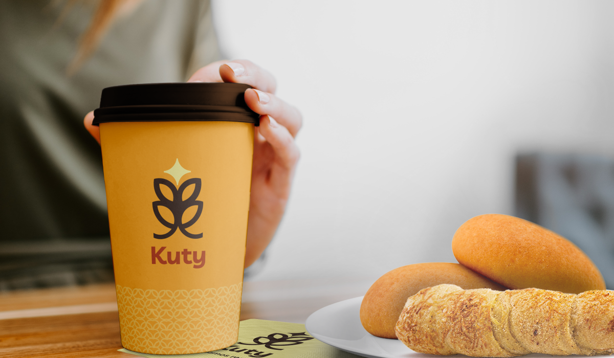 Coffee-Cup-with-Hand-Mockup